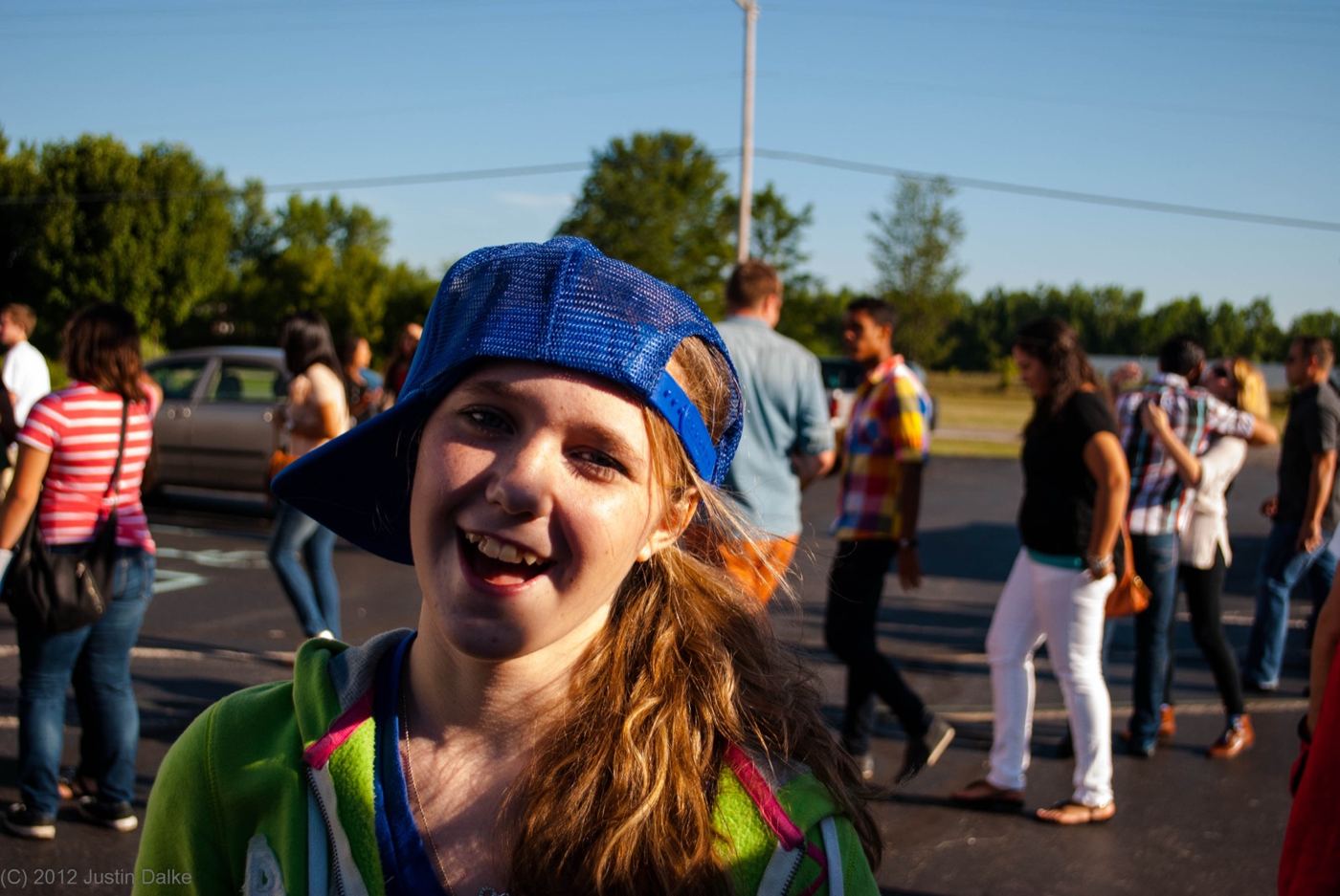A camper laughing outside