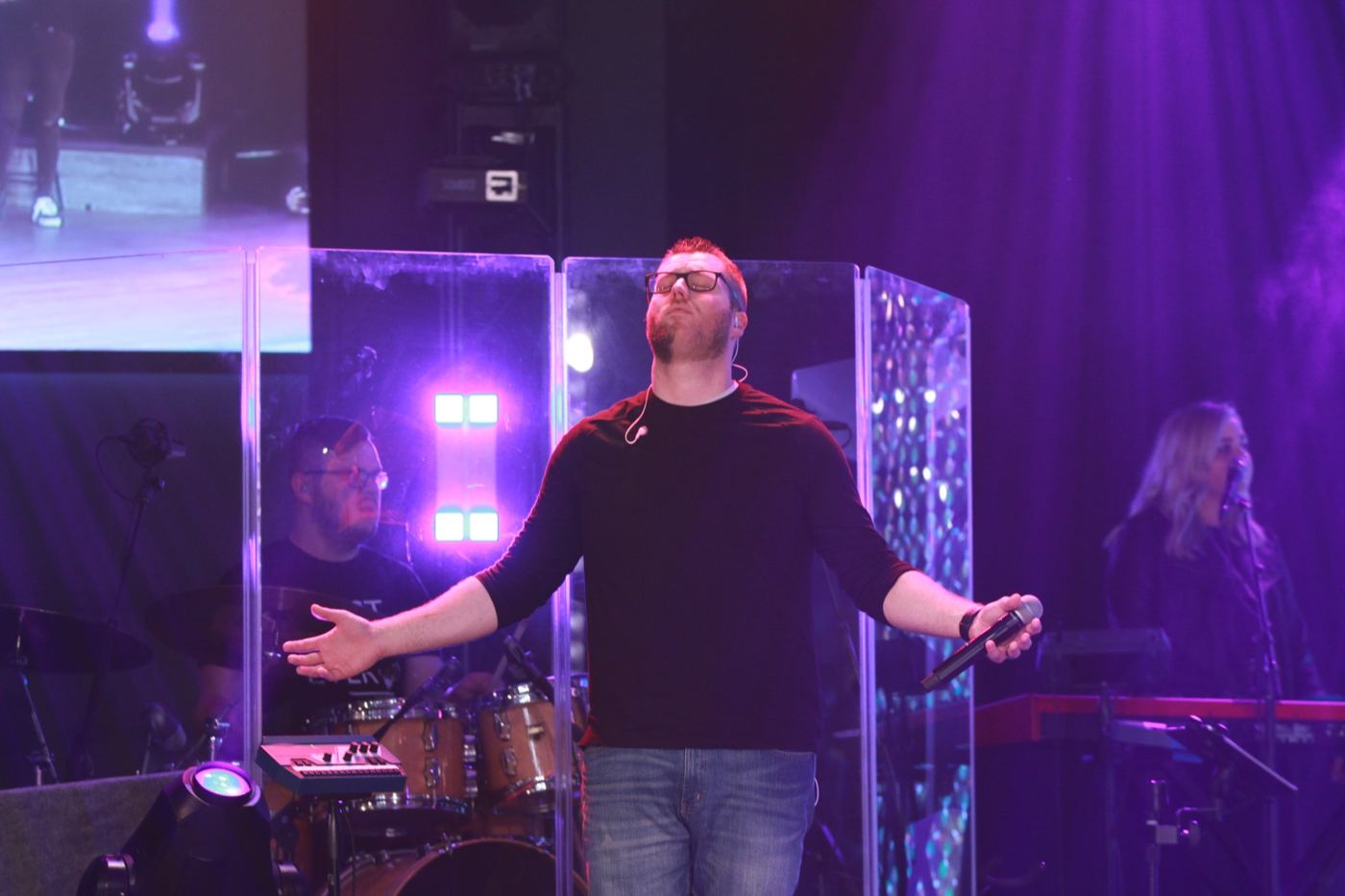 Worship with arms open in 2019